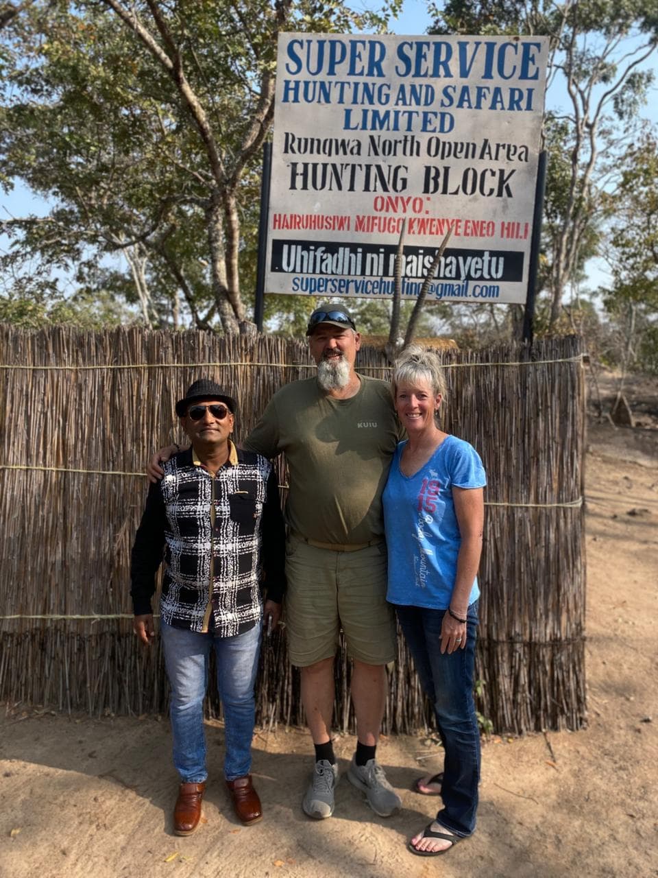 Hassanali and clients at official Super Service Rungwa North Hunting Block sign, Tanzania