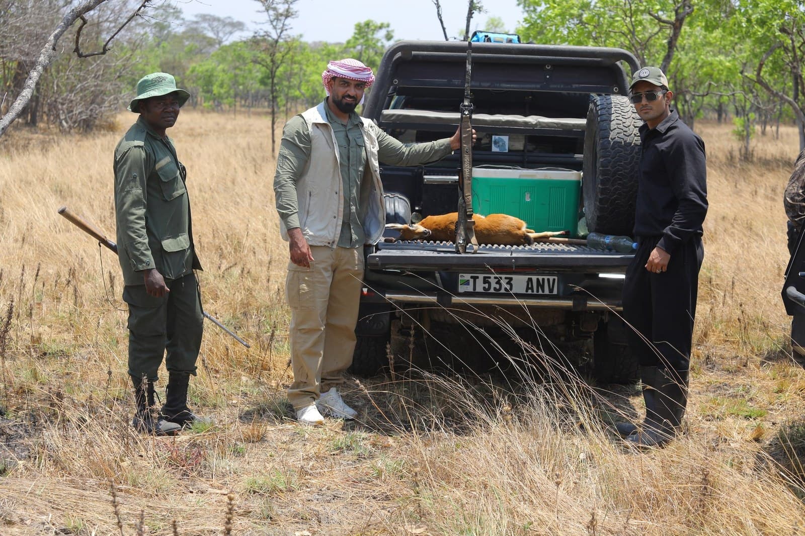 Post-hunt reedbuck with Gulf client and TAWA official, Rungwa North Tanzania